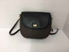 MICHAEL KORS - a black and brown handbag