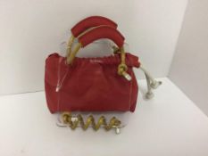 SCOTRIA - a red handbag