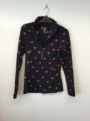 GOLDBERGH LUXURY SPORTS - a ladies black zip up overhead jumper with heart print, size 10