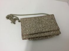 JIMMY CHOO - a rose gold glittery chain shoulder bag