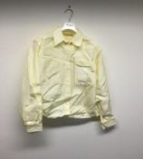 SHIRTS 1961 - a ladies cream shirt