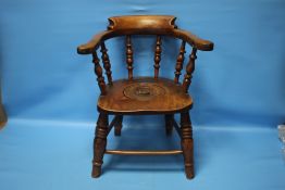 A CHILDS COMMODE CHAIR, in the style of a smokers bow chair