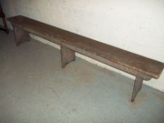 AN ANTIQUE WOODEN BENCH, L 2.4 M