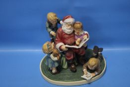 A HUMMEL FIGURE GROUP 'STORY TIME WITH SANTA'