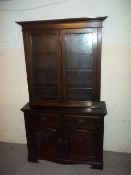 AN ANTIQUE DARK WOOD CARVED WALL UNIT WITH LOCKS, W 123 CM, H 214 CM