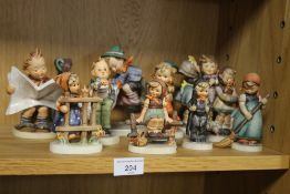 A COLLECTION OF HUMMEL FIGURES