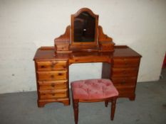 A SOLID PINE DUCAL DRESSING TABLE WITH MIRROR AND STOOL