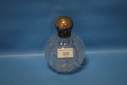A HALLMARKED SILVER TOPPED BOTTLE