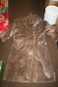 A LADIES FUR JACKET, SIZE 14