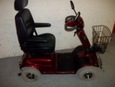 A LARGE INVALID SCOOTER
