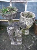 TWO CONCRETE PEDESTAL PLANTERS AND A CONCRETE STATUE