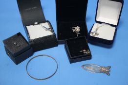 A COLLECTION OF MAINLY SILVER COSTUME JEWELLERY TO INCLUDE EARRINGS, A BANGLE, NECKLACES ETC.
