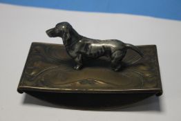 A WMF ART NOUVEAU STYLE DESK BLOTTER WITH DACHSUND FINIAL