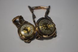 A VINTAGE 9 CT GOLD WRIST WATCH ON A 9 CT EXPANDING STRAP ALONG WITH A SIMILAR SMALLER 9 CT WATCH ON