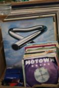 A QUANTITY OF RECORDS AND SINGLES TO INCLUDE TUBULAR BELLS, ROY ORBISON, TOM JONES ETC.