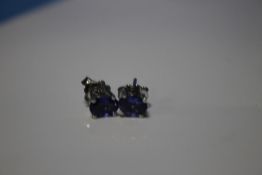 A PAIR OF TANZANITE SILVER STUDS