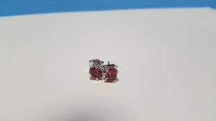 A PAIR OF PINK TOURMALINE, SILVER STUDS