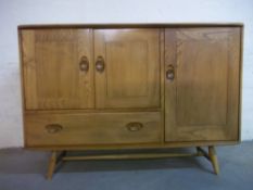 AN ERCOL STYLE SIDEBOARD, H 81 cm, L 113 cm, W 47 cm