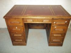 AN ANTIQUE TWIN PEDESTAL LEATHER INLAID OAK DESK, L 122 cm, D 72 cm, H 76 cm