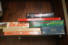 A SMALL COLLECTION OF VINTAGE GAMES TO INCLUDE ESCULADO, MONOPOLY ETC.