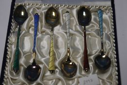 A SET OF SIX DANISH 925 SILVER AND ENAMEL TEASPOONS IN A FITTED CASE