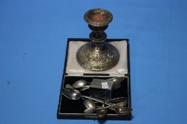 A QUANTITY OF SILVER ITEMS TO INCLUDE A CANDLESTICK, SPOONS, SUGAR TONGS ETC.