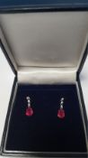 A PAIR OF 18 CT WHITE GOLD RUBY AND DIAMOND DROP EARRINGS WITH BUTTERFLY BACKS, RUBIES ARE 2.00