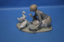 A LLADRO FIGURE GROUP