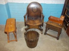 AN ANTIQUE LEATHER CHAIR, A DROPLEAF OAK TABLE, AN OAK STOOL, A WOODEN BUCKET AND A DOLL'S CRADLE (