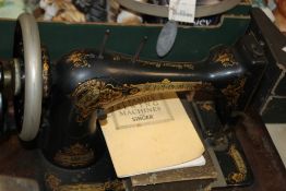 A SINGER SEWING MACHINE