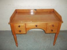 AN ANTIQUE PINE DESK