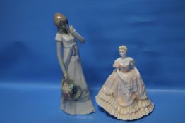 A COALPORT FIGURINE 
