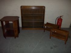 A GLAZED BOOKCASE AND A HALL TABLE WITH TWO MAGAZINE RACKS