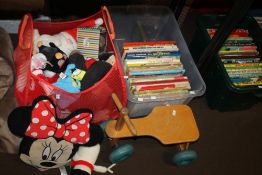 A COLLECTION OF SOFT TOYS, CHILDREN'S BOOKS, A WOODEN TODDLERS FOUR WHEELED BIKE, ETC.