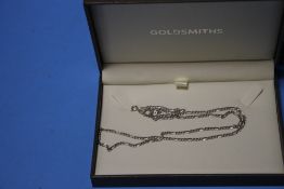 A BOXED SILVER NECKLACE