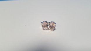 A PAIR OF MORGANITE SILVER STUDS