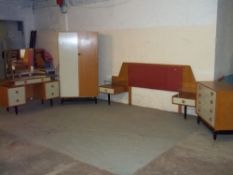 A G-PLAN FOUR PIECE BEDROOM SUITE TO INCLUDE FOUR DRAWER CHEST, WARDROBE, DRESSING TABLE ETC.