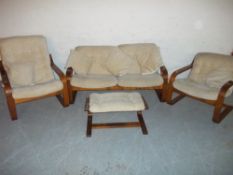 AN IKEA POANG STYLE FOUR PIECE SUITE - TWO SEATER SOFA, TWO CHAIRS AND A FOOT STOOL