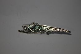 A LARGE SILVER PLIQUE-A-JOUR LOCUST BROOCH SET WITH CABOCHON, RUBY AND MARCASITE