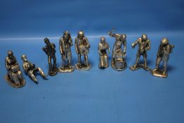 A COLLECTION OF WHITE METAL FIGURES
