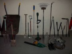 A QUANTITY OF GARDEN TOOLS TO INCLUDE A WHEELBARROW, AND A GALVANISED VINTAGE ZINC WATERING CAN