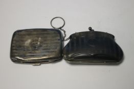A HALLMARKED SILVER CIGARETTE CASE A/F AND A HALLMARKED SILVER COIN PURSE