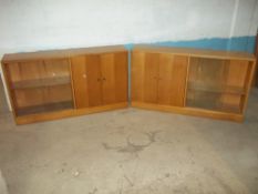 TWO GLAZED BOOKSHELF CUPBOARDS, L 137 CM