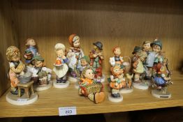 A COLLECTION OF HUMMEL FIGURES