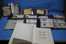 FIVE ALBUMS OF FIRST DAY AND COMMEMORATIVE COVERS, to include railway types and a selection from