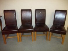 FOUR MODERN FAUX LEATHER DINING CHAIRS