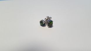 A PAIR OF CABOCHON BLACK ETHIOPIAN OPAL SILVER STUDS