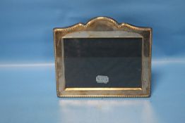 A HALLMARKED SILVER PICTURE FRAME