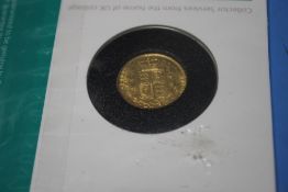 A VICTORIAN 1854 SHIELD BACK SOVEREIGN IN ROYAL MINT COLLECTORS SERVICES PACKET.