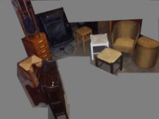 TEN ITEMS CONSISTING OF A LEATHER SWIVEL CHAIR, STOOLS, A LLOYD LOOM OVAL LINEN BASKET, A LOOM CHAIR